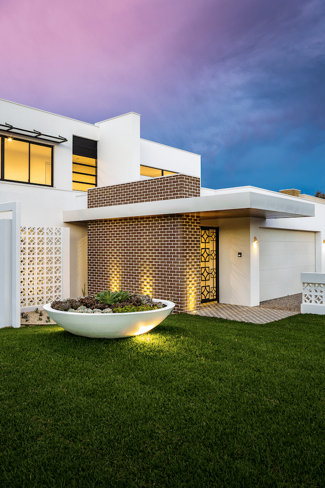Exterior front view of luxury palm springs inspired home